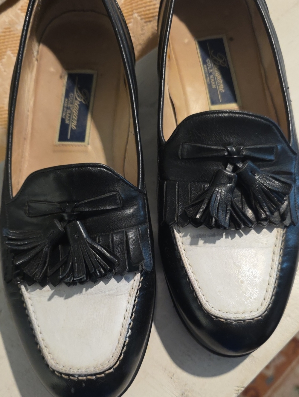 Cole Haan Black and White Tassel Kiltie Loafers